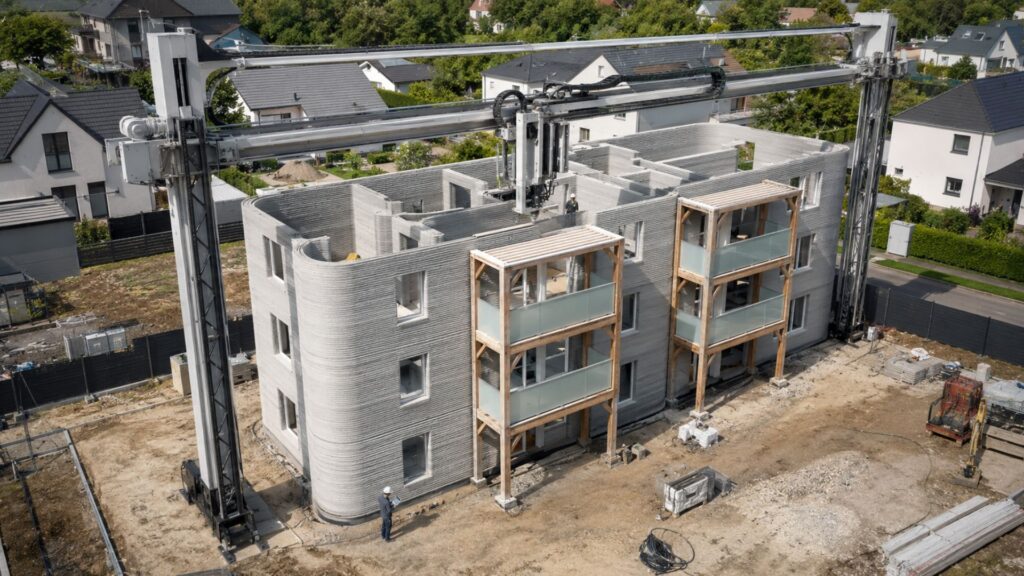 mpressora gigante ergue maior prédio de apartamentos impresso em 3D