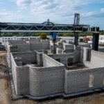 mpressora gigante ergue maior prédio de apartamentos impresso em 3D